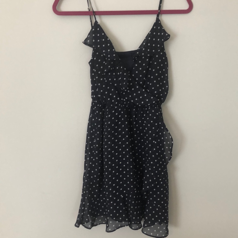 Navy blue polka dot strapped dress